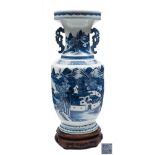 A Chinese Export blue and white vase: of baluster form with pierced chilong handles,