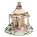 A Chamberlain's Worcester pastille burner: in the form of an octagonal rustic cottage encrusted