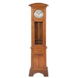 An Art Nouveau oak chiming longcase clock: the eight-day duration,