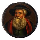 A 19th century papier mache snuff box: the circular lid decorated with a portrait of a bearded