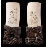 A Japanese carved ivory tusk vase: depicting bijins with lanterns, one is chasing away a bat,