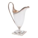 A George V silver cream jug, maker David & Maurice Davis, Birmingham,