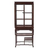 A Chinese wood display cabinet on a stand:, the upper part with a moulded frieze,