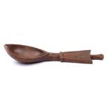 An African Kenya/Somali [Boni] carved fruitwood spoon: with pointed bowl,