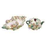 A mid 19th century English miniature flower encrusted basket and a similar teapot and cover: the