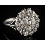 A diamond circular cluster ring: with graduated round,
