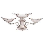 A silver plated twin-branch table centrepiece: the central cartouche-shaped dish on a waisted stem