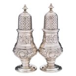 A pair of George V silver pepperettes, maker C S Harris & Sons Ltd, London,