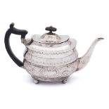 A George III silver teapot, maker Thomas Wallis II, London 1807: of barge-shaped outline,