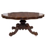 A Victorian rosewood circular scallop edge dining table:,