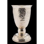 * An Elizabeth II beaten silver goblet, maker Rod Kelly, London,