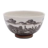 A Du Paquier porcelain teabowl: painted in schwarzlot with figures and buildings in a continuous