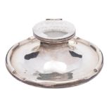 A George V silver capstan inkwell, maker Elkington & Co, Birmingham, 1910: inscribed,