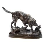 Prosper Lecourtier (1855-1924) A bronze study of a setter: mounted on a naturalistic oval base,