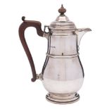A George V silver hot water jug, maker Adie Brothers, Birmingham,