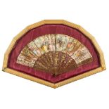 A 19th century Continental tortoiseshell fan: the leaf decorated with young gallants and ladies in