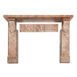 A 19th Century rouge variegated marble fireplace:, the shelf with cut corners,
