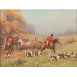 John Sanderson Wells [1872-1955]- Foxhounds on the scent,