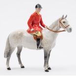 A Beswick Huntsman on grey horse:, No 1501, 21cm high.