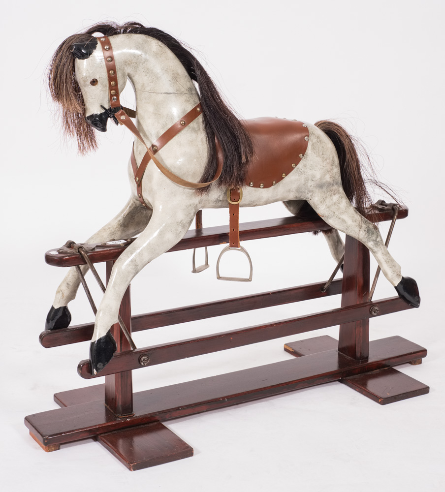 A 20th century rocking horse:, the painted dapple body with hair mane and tail,