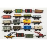 Hornby O gauge a group of goods wagons:, two crane trucks, a rotary tipping wagon, GWR goods wagon,