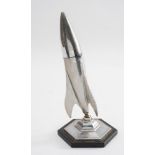 An Art Deco chrome Rocket table lighter by Planet:,
