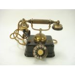 An early 20th century Danish brass and lacquer telephone by K Jobenhavns:,