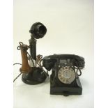 An early 20th century Post Office No 2 telephone:, in black with brown ear piece:,