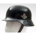 A WWII period German Stahlhelm: with RAD badge to one side, in black,