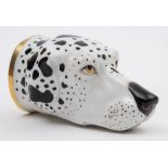 A Continental porcelain stirrup cup in the form of the head of a Dalmatian: modelled after a Derby