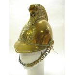 A late 19th/early 20th century brass Merryweather pattern fireman's helmet:,