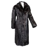 A lady's black fur three quarter length coat:, in a Calman Links bag.