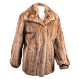 A mid 20th century fur jacket:, with brown silk lining.