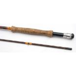 A Hardy No 6 8 1/2 ft three piece carbon rod in canvas bag:.