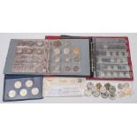 A collection of modern British and world coins: contained in albums, box and files.