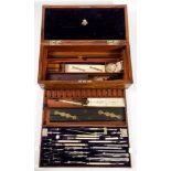 A late 19th/early 20th century steel and ivory draughtsman's set by Troughton & Simms, London:,