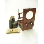 An early 20th century mahogany graphoscope with 4 inch magnifier:,