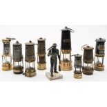 A group of seven various miners lamps:, including two by F Thomas & William Ltd, Aberdeen,