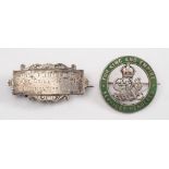 A George V green enamelled wound badge:, inscribed to the reverse ''Lce,