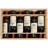 A case of twelve bottles of Lalande De Pomerol 2001: Christian Moueix.