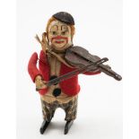 Schuco (Germany) a clockwork clown violinist:, black felt cap, painted face,