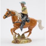 A Beswick 'Canadian mounted' cowboy designed by Mr Orwell model no 1377:,