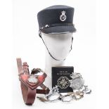 A mid 20th century Policewoman's peaked hat with Merseyside Police badge:,
