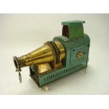 A late 19th/early 20th century brass and tinplate magic lantern:, the body over painted green,