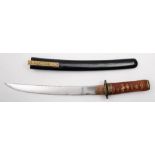 A Japanese tanto:, unsigned, the 12 inch blade over a copper habaki and gilt tsuba,