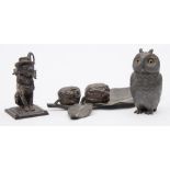 An early 20th century bronze vesta holder in the form of Mr Punch's dog: together with a
