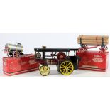A Mamod live steam showman's traction engine:, black roof with lights,