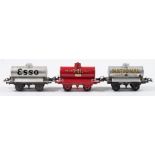 Hornby O gauge, a group of six petrol tank wagons:, ' Mobiloil', 'Shell Motor Spirit', 'National',