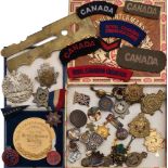 A collection of various cap and lapel badges:, including Le Regiment de Maisonneuve and others ,