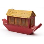 An early 20th century wooden Noah's Ark:, with yellow roof and red painted hull,